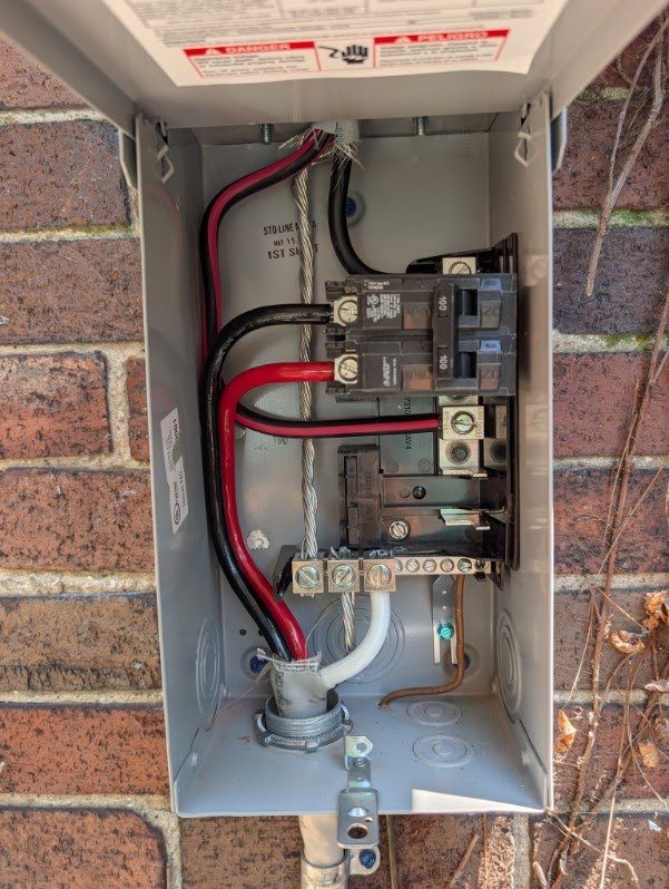 Outdoor disconnect with new breakers wired by VECA
